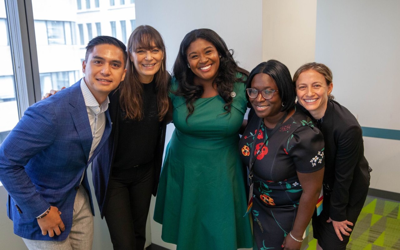 2018 Ainslie Award winner Gabrielle Farrell (center) with Posse President + Founder Deborah Bial and past Ainslie winners.