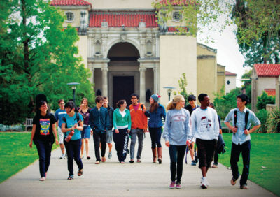 Students walk on the Pomona College campus
