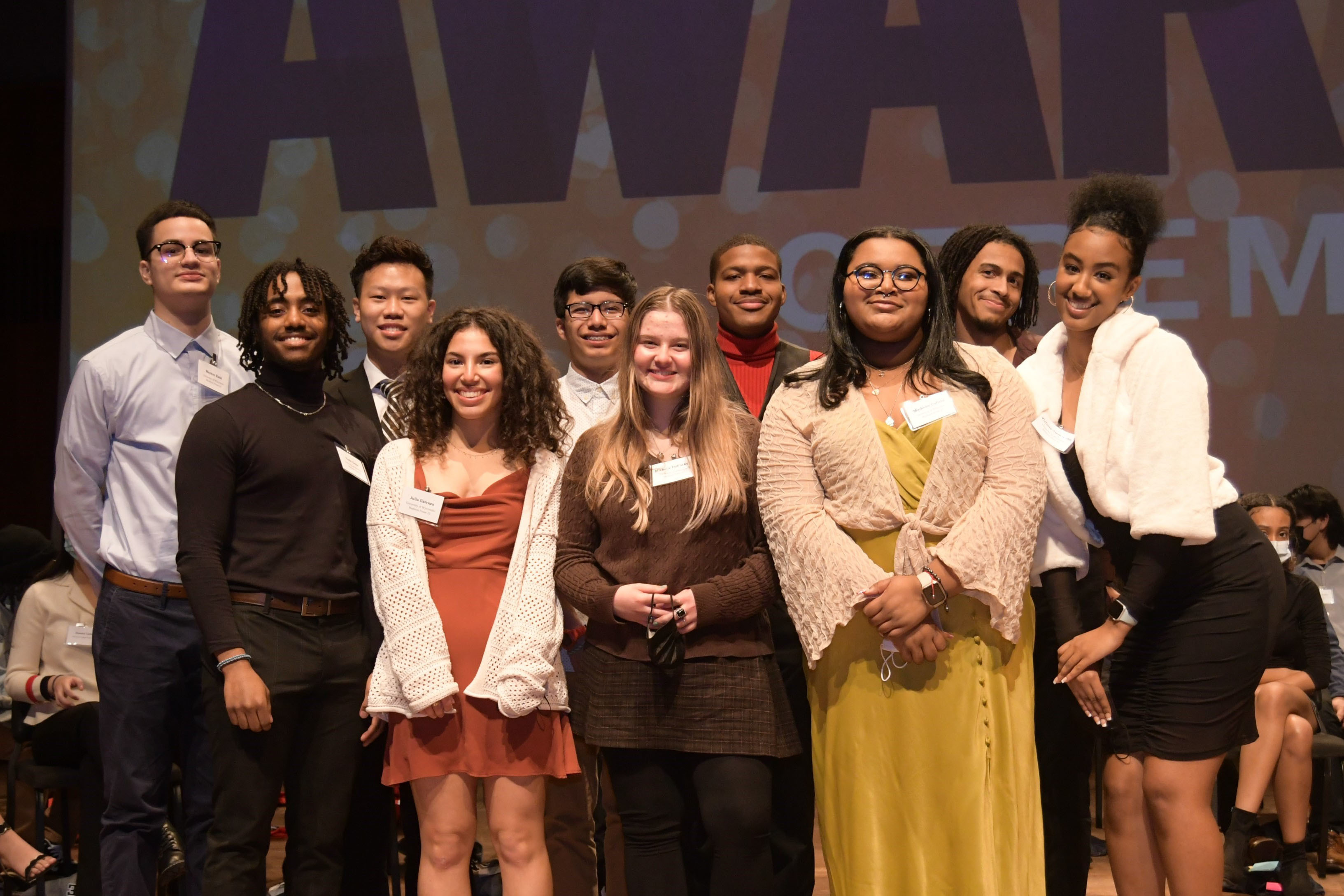 group of young adults at a ceremony