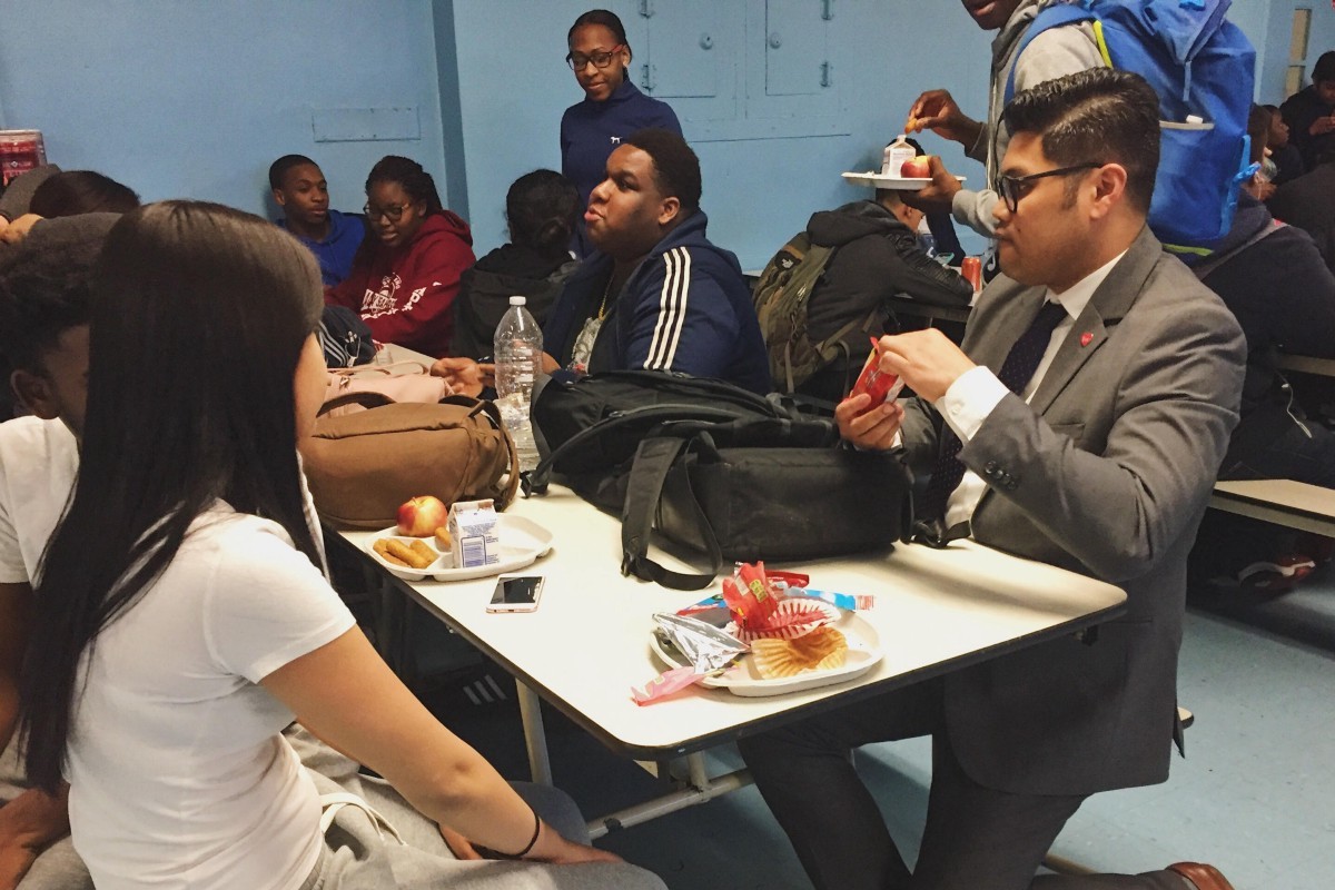 Carl Manalo at lunch with QIRT students. (Photo: Madison Darbyshire)