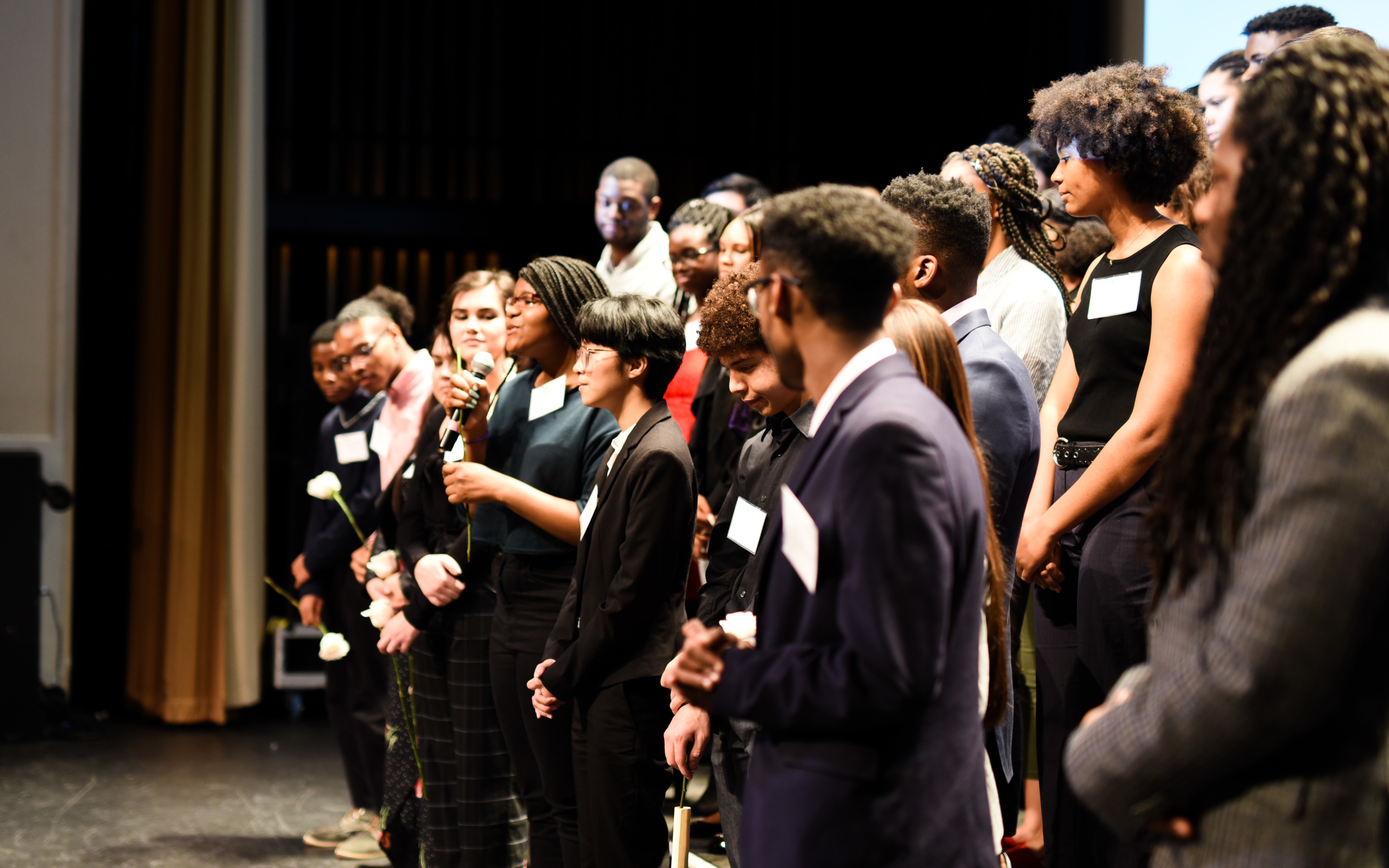 Lafayette Scholar EdLafayette Scholar Ednetta Fullmore spoke during the ceremony, surrounded by fellow Posse Scholars.netta Fullmore shares during the open-mic surrounded by fellow Posse Scholars