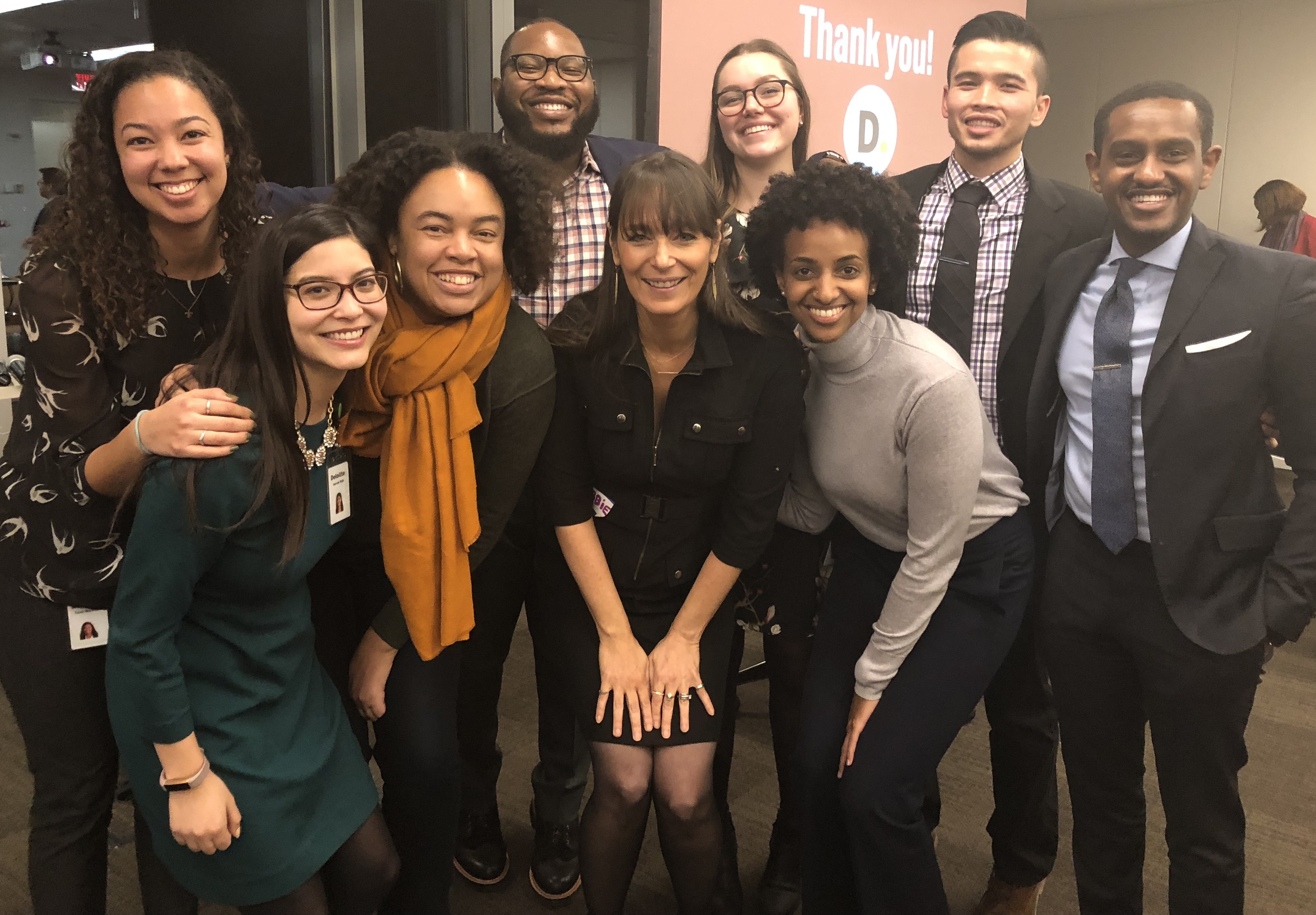 Posse alumni Deloitte employees with Posse President and Founder Deborah Bial (center) in 2018.