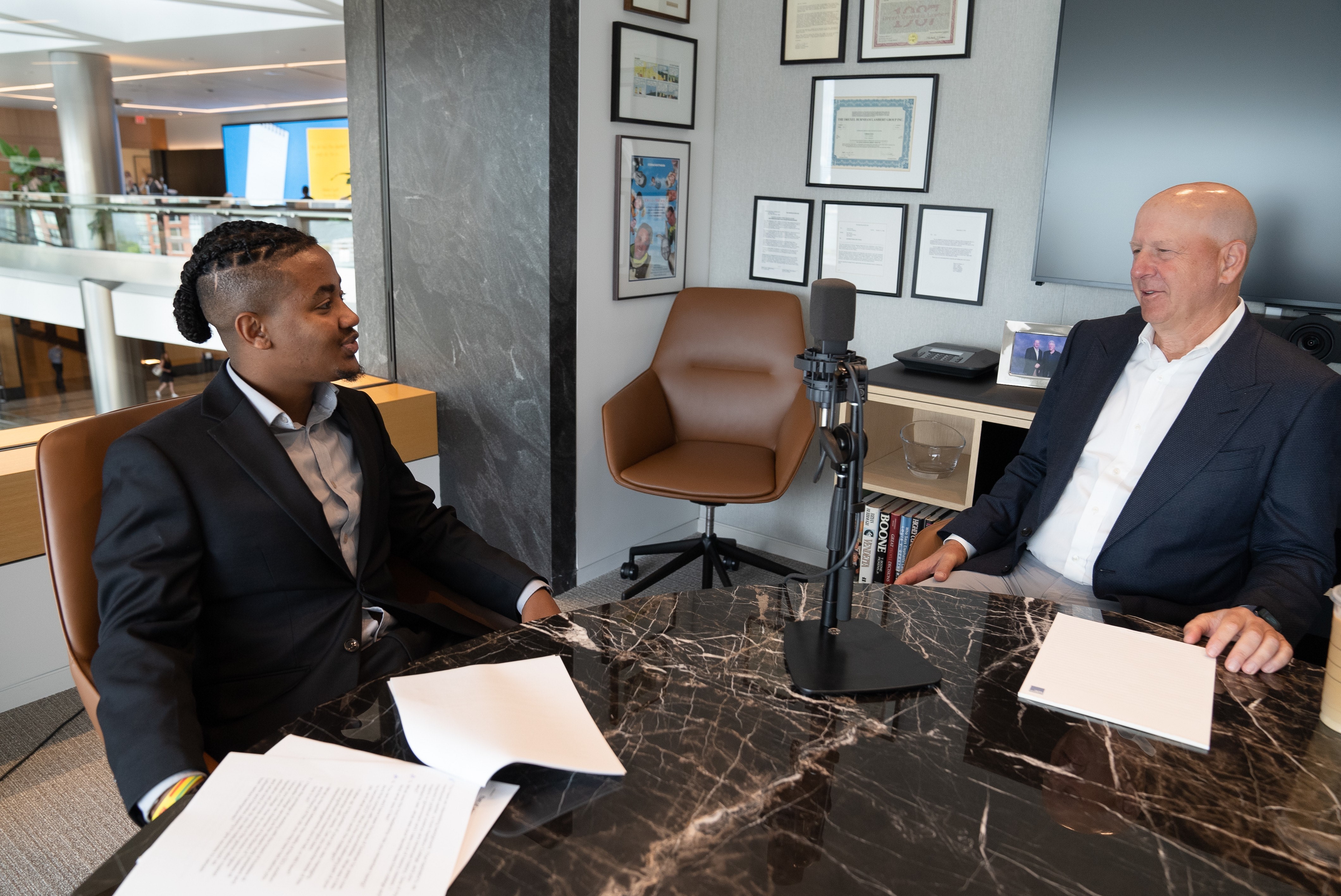 2022 Jeff Ubben Posse Fellow Matwos Tadesse with Goldman Sachs Chairman and CEO David Solomon.
