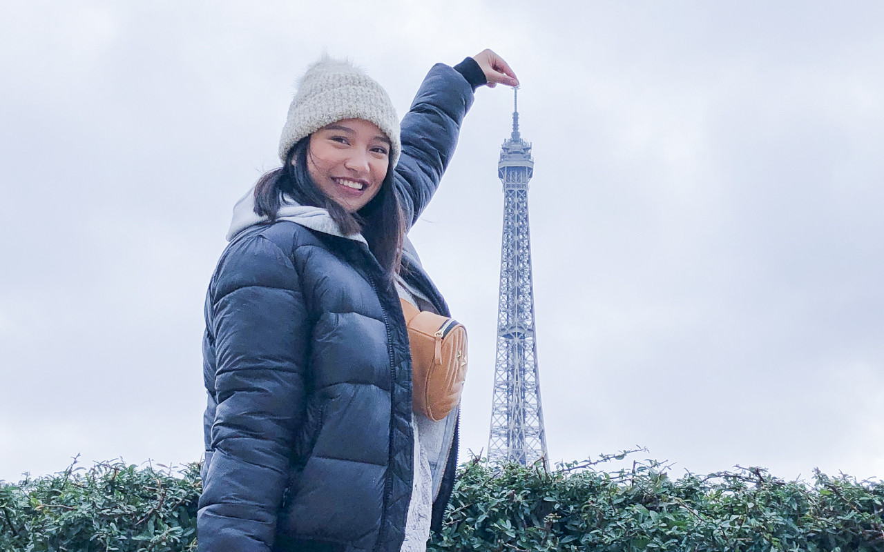 Franz Mangonon at the Eiffel Tower in Paris.