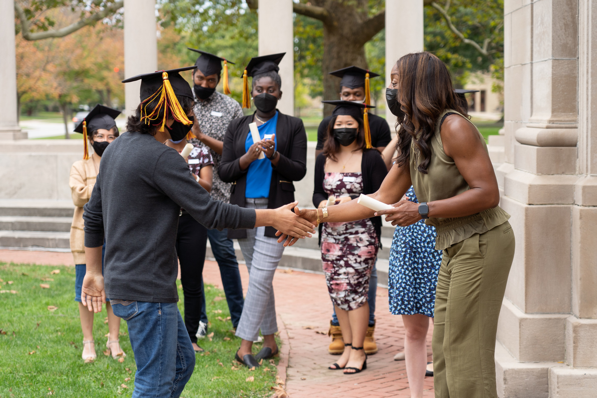 Posse Scholars with Oberlin College President Carmen Twillie Ambar (right) at the ceremony.