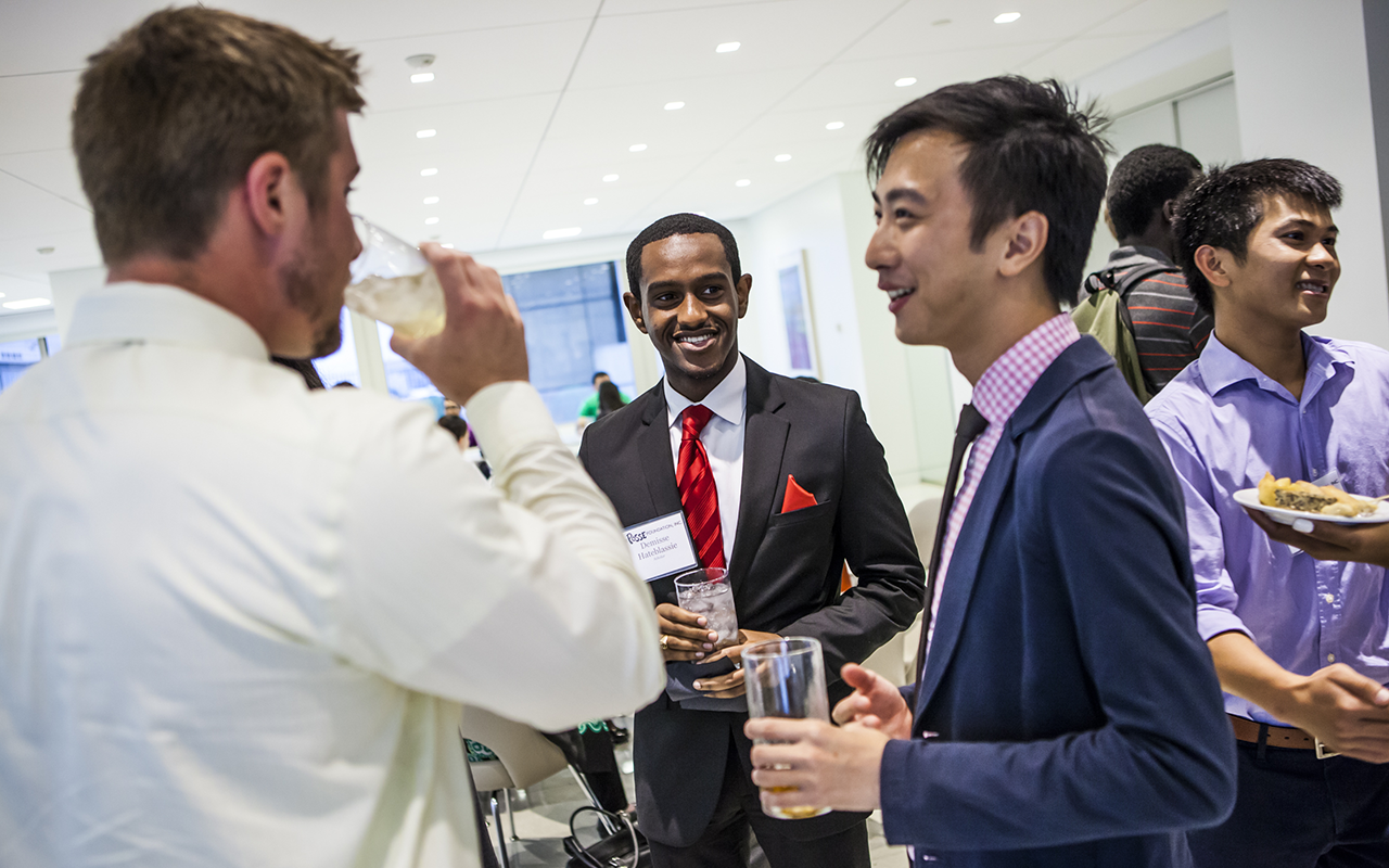 Demisse Habteselasie (center), a Pepperdine Posse Scholar, at the 2013 D.C. Internship Celebration