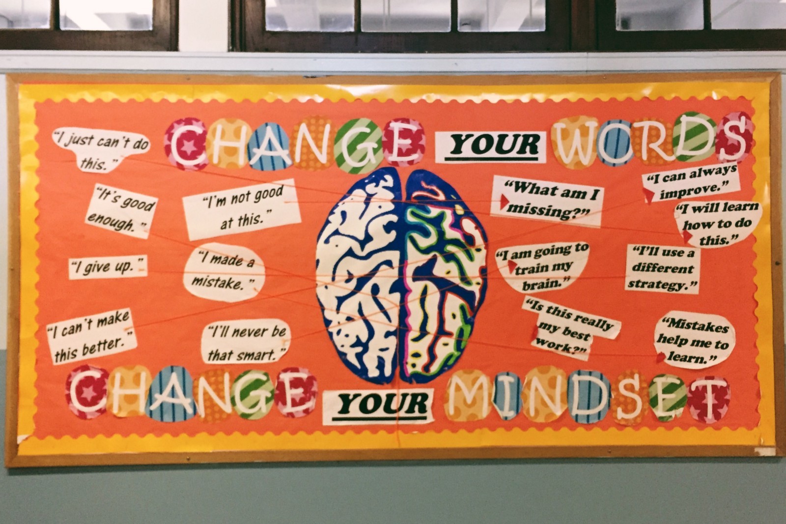 A "Change Your Words, Change Your Mindset" bulletin board at QIRT. (Photo: Madison Darbyshire)