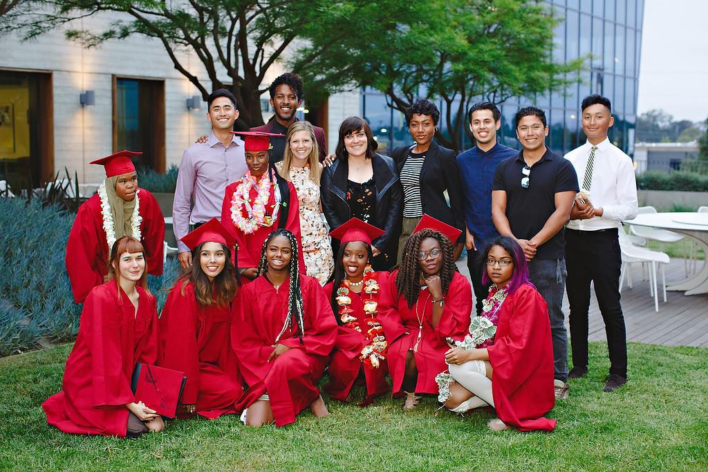Erin Whalen (back row) with graduating students and community members at the first RISE High graduation in 2017.