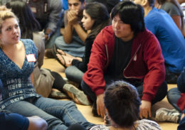 Young woman speaking at retreat
