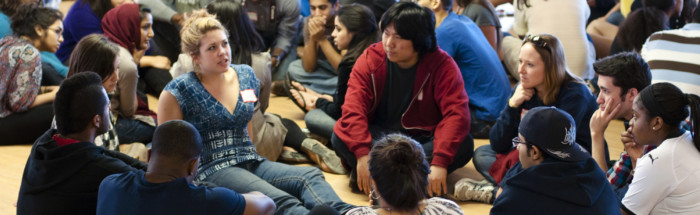 Young woman speaking at retreat