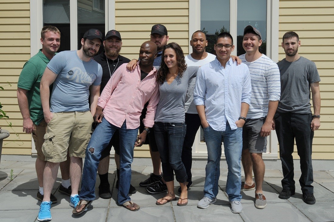 The first cohort of Wesleyan Posse Scholars, all now graduates. One Scholar, Kyle Foley (center), graduated early.