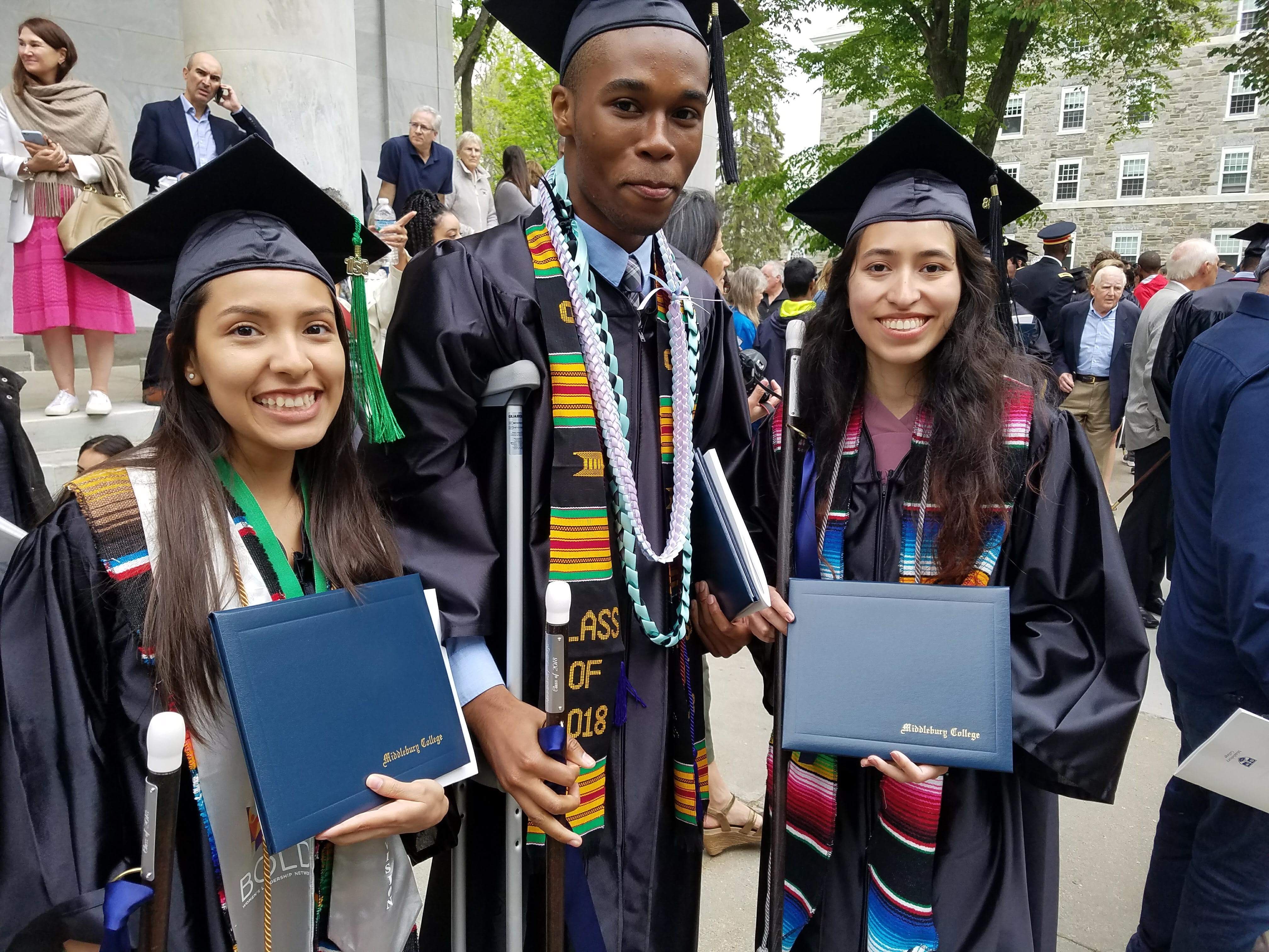 Yuliana López at Middlebury commencement with fellow Posse Scholars Terrence Smith and Monica Melendez.