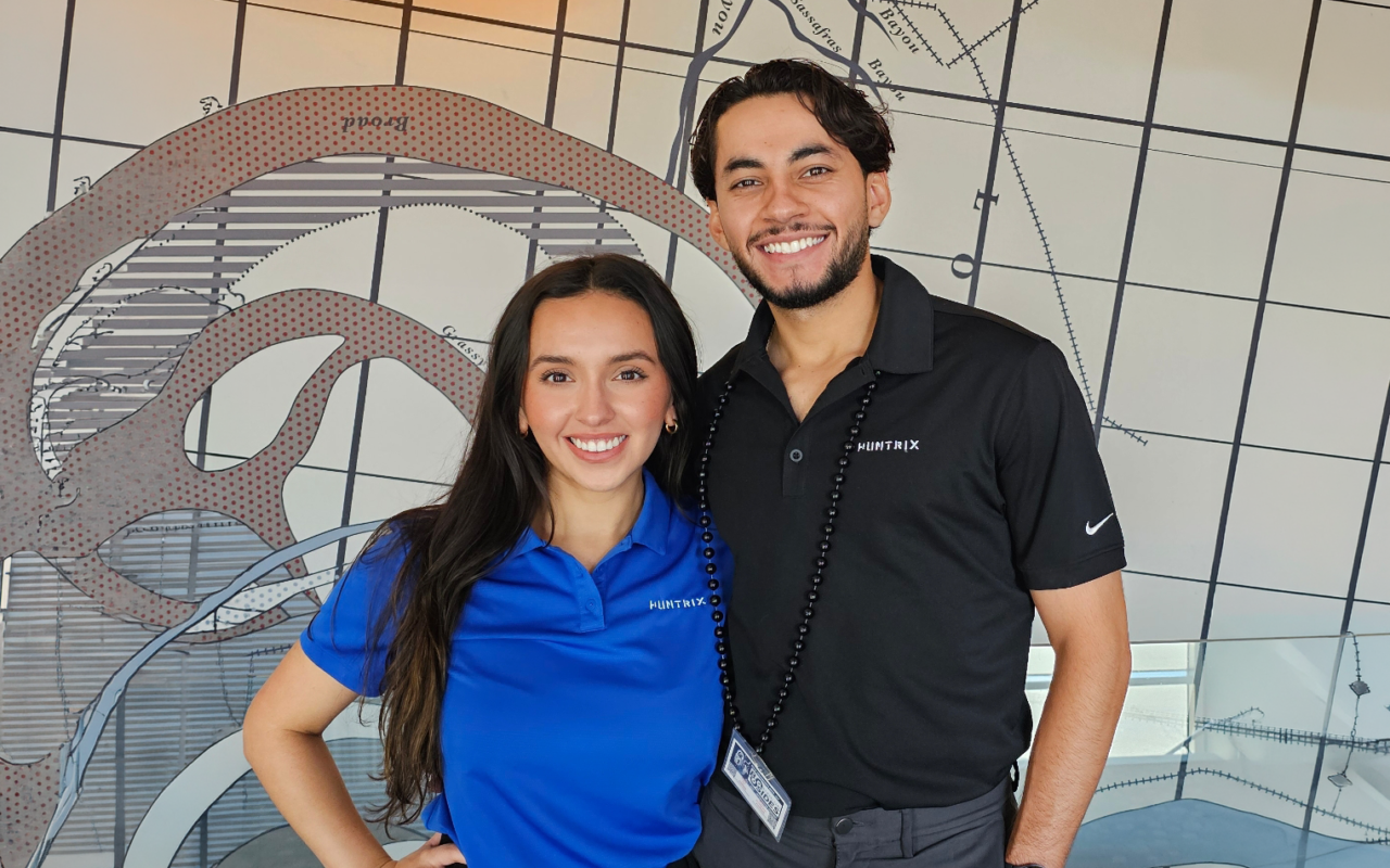 man and woman smiling