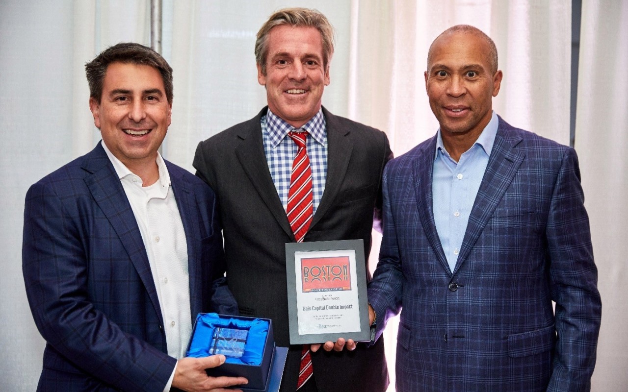 Bain Capital Double Impact Managing Directors Todd Cook, Warren Valdmanis and Governor Deval Patrick.