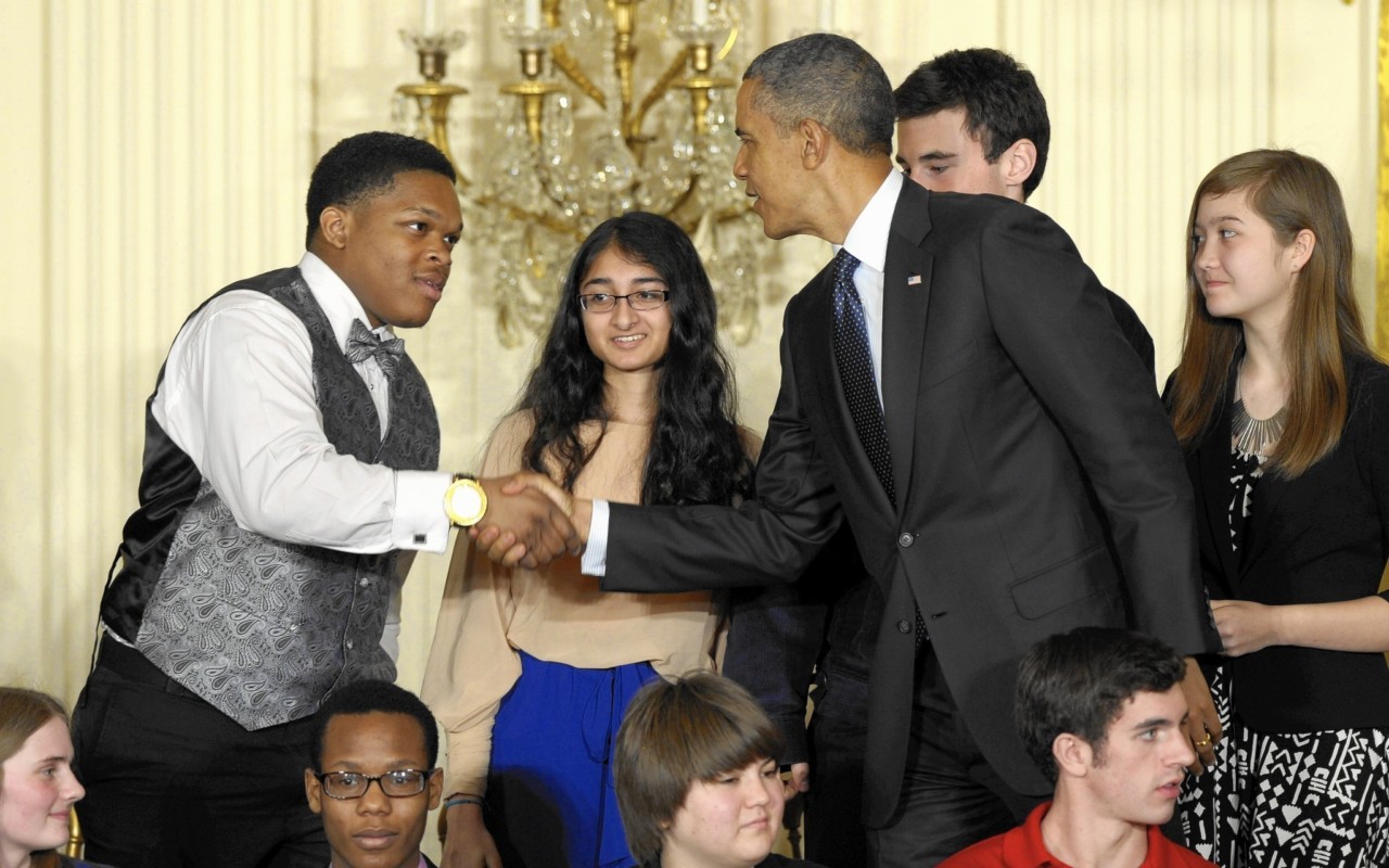 Chicago Tribune: President Barack Obama shakes hands with Posse Scholar Anthony Halmon during a 2013 event celebrating young scientists at the White House. (Susan Walsh / Associated Press)