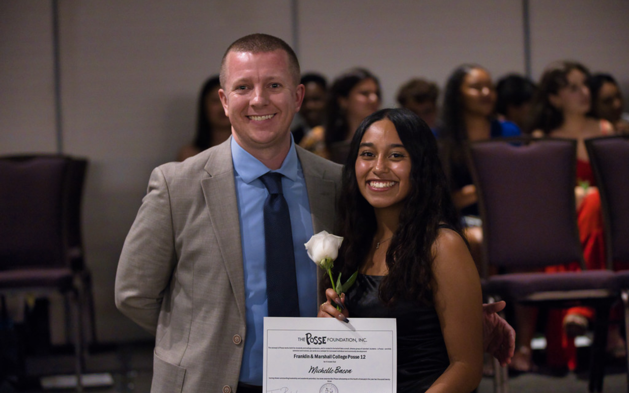 Two people smiling 