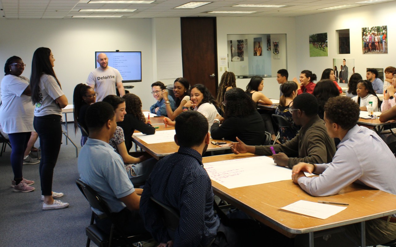 Deloitte volunteers and Posse Scholars worked together on Deloitte Impact Day.