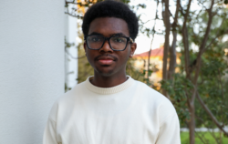 man in white sweater.
