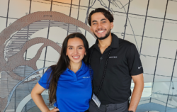 man and woman smiling