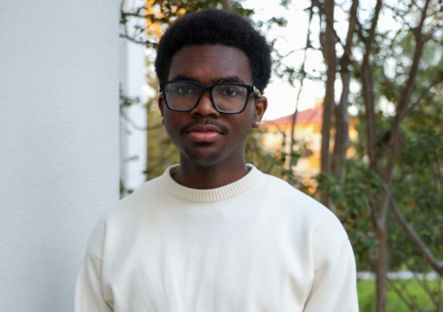 man in white sweater.