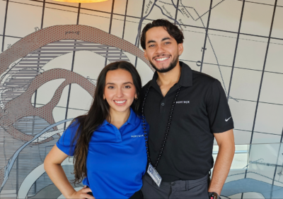 man and woman smiling