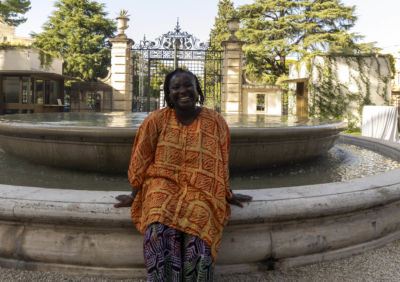 woman smiling.