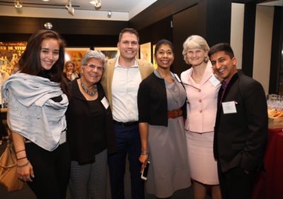 Patrick DeYoung (center) with fellow leaders of the Vassar Refugee Solidarity, Professor Höhn (second from left) and Vassar President Elizabeth Bradley (second from right).