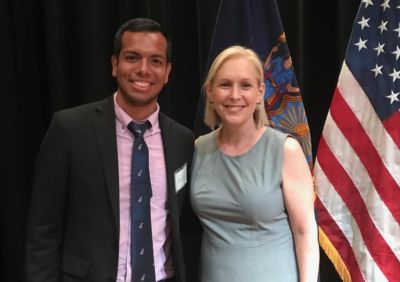 Babson College Posse Scholar Leo Loyola with U.S. Senator Kirsten Gillibrand.