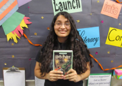 Sophia Bravo (Syracuse Posse 1) at Literacy Corps where she tutors bilingual elementary school students.