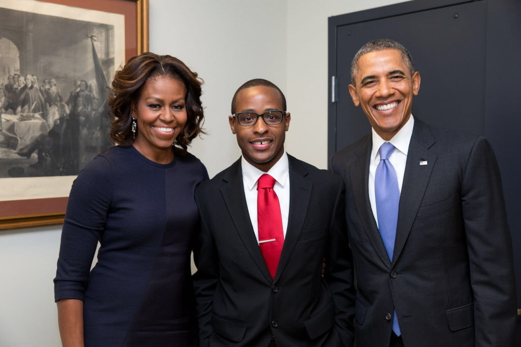 Troy Simon with First Lady Michelle Obama and President Barack Obama in 2014.