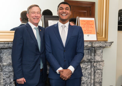 Left to right: Senator John Hickenlooper; 2022 Jeff Ubben Posse Fellow Alexander Robinson.