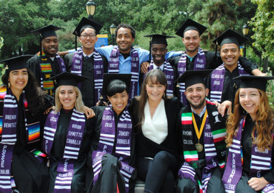 Posse President + Founder Deborah Bial with new Posse graduates.