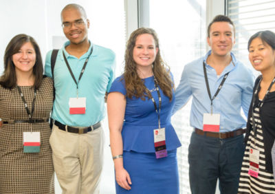 Trinity College Posse alumna Nicole Tsesmelis (center) with fellow alumni at the annual Posse leadership conference.